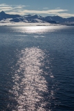 Sun reflecting on water.  Isfjorden, Svalbard