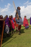 Masai warriors demonstrate agility in jumping contest.