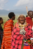 Masai woman singing at her village just outside Ngorogoro crater